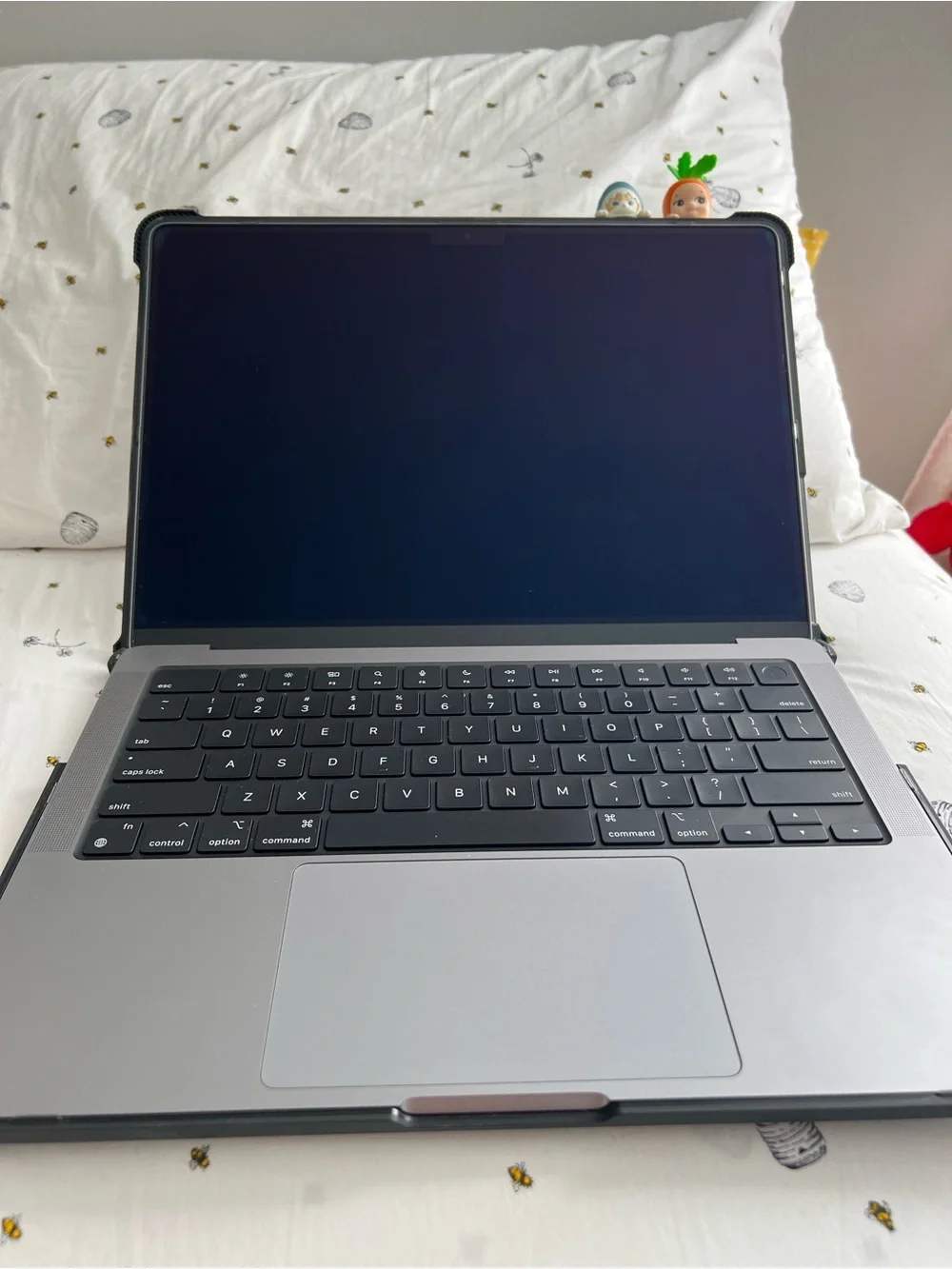 Apple Silver Laptop with Colorful Monsters University Sticker Collection